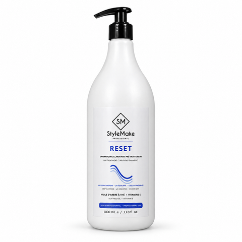 StyleMake Professional RESET 1000 mL pre-treatment clarifying shampoo in a white pump bottle, front view on white.